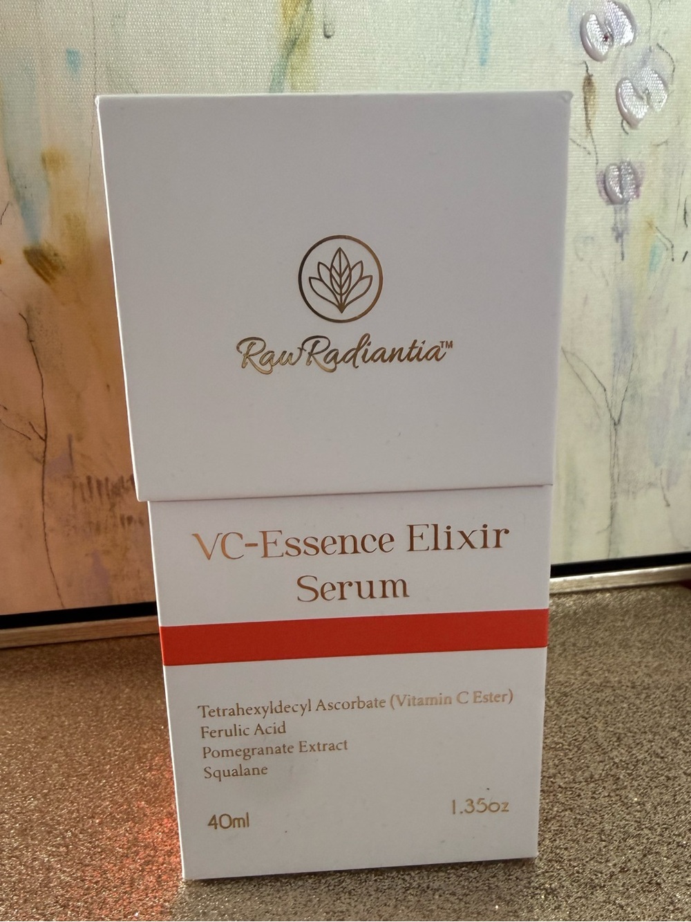 NIB 1.35oz Raw Radiantia VC-Essence Elixir Serum - White with Orange Accent